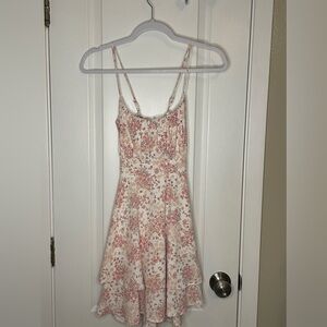 Floral dress, with a strap tie in the back.